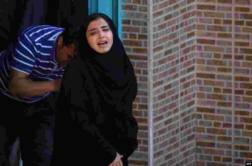 An Iraqi woman mourns during the funerals of victims of bombings in Baghdad's mostly Shi'ite Sadr City district on February 28. Bombings claimed by the Islamic State militant group killed at least 73 people, the deadliest attacks in the Iraqi capital this year. (AFP/Haidar Hamdani)