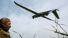 FILE PHOTO: A Ukrainian servicemember looks at a reconnaissance drone as it launches from a position near the front line at an undisclosed location in southern Ukraine on an undisclosed date in 2026.