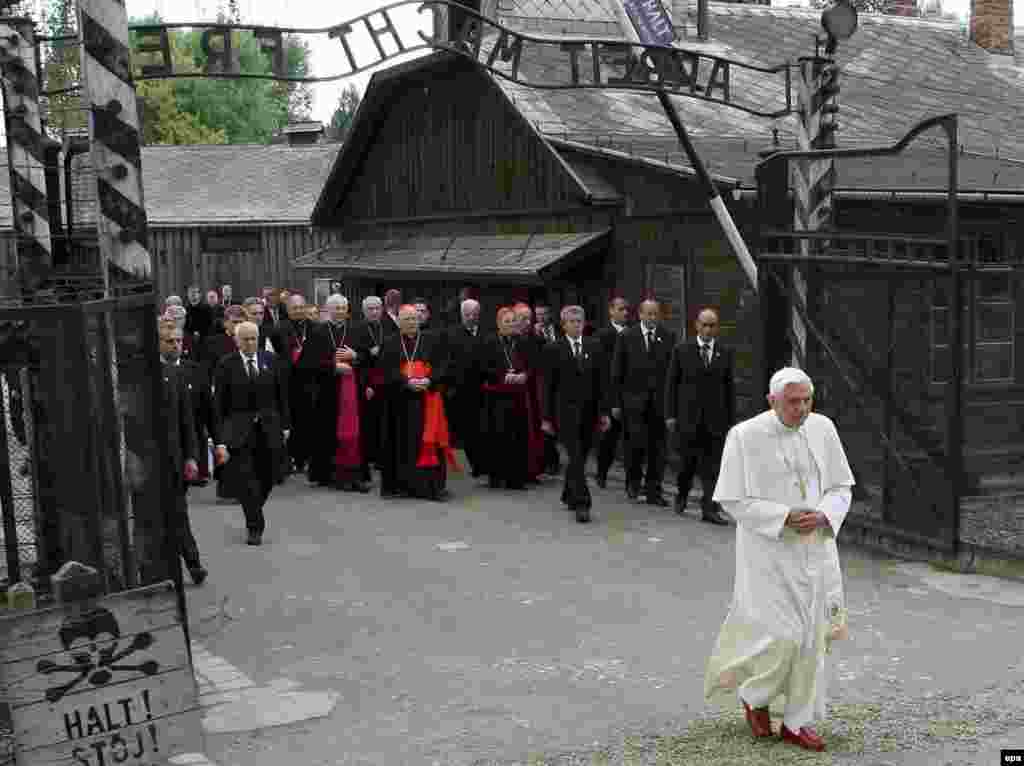 Pope Benedict passes through the gate of the Nazi concentration camp of Auschwitz in Poland in May 2006.