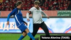 CHECHNYA -- Chechen leader Ramzan Kadyrov (R) plays during a soccer match between the team" Leader "and the team of veterans of Italy in honor of the birthday of the Russian President Vladimir Putin in Grozny, October 7, 2017