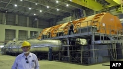 A Russian technician walks inside the Russian-built Bushehr nuclear power plant in Iran.