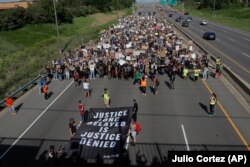 Акция протеста в Миннеаполисе, где был убит Джордж Флойд, 31 мая 2020 года.