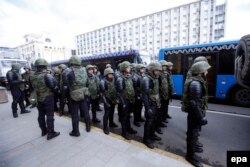 Members of the National Guard gather prior to an opposition rally in central Moscow on June 12.