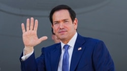 US Secretary of State Marco Rubio boards a US Air Force transport aircraft as he leaves Bahrain on June 25.