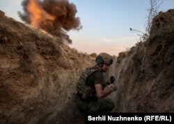 Ordnance is destroyed in an explosion at a training ground in eastern Ukraine.