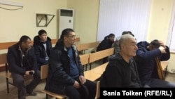 Работники нефтесервисного предприятия Oil Construction Company (OCC) в суде в городе Актау. 23 января 2017 года.