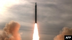 An Iranian mid-range missile test in December. The IAEA is concerned that Iran is developing a nuclear payload.