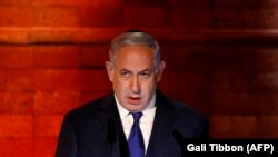 Премьер-министр Биньямин Нетаньяху Холокостту эскерүү жыйынында сүйлөп жаткан кези. Иерусалим, 11-апрель, 2018-жыл. 