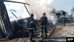 Firefighters extinguish a fire at the site of a drone attack in the Dnipropetrovsk region on May 3.