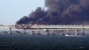 Incendiu pe podul Kerci după explozie, Crimeea ocupată, 8 octombrie 2022