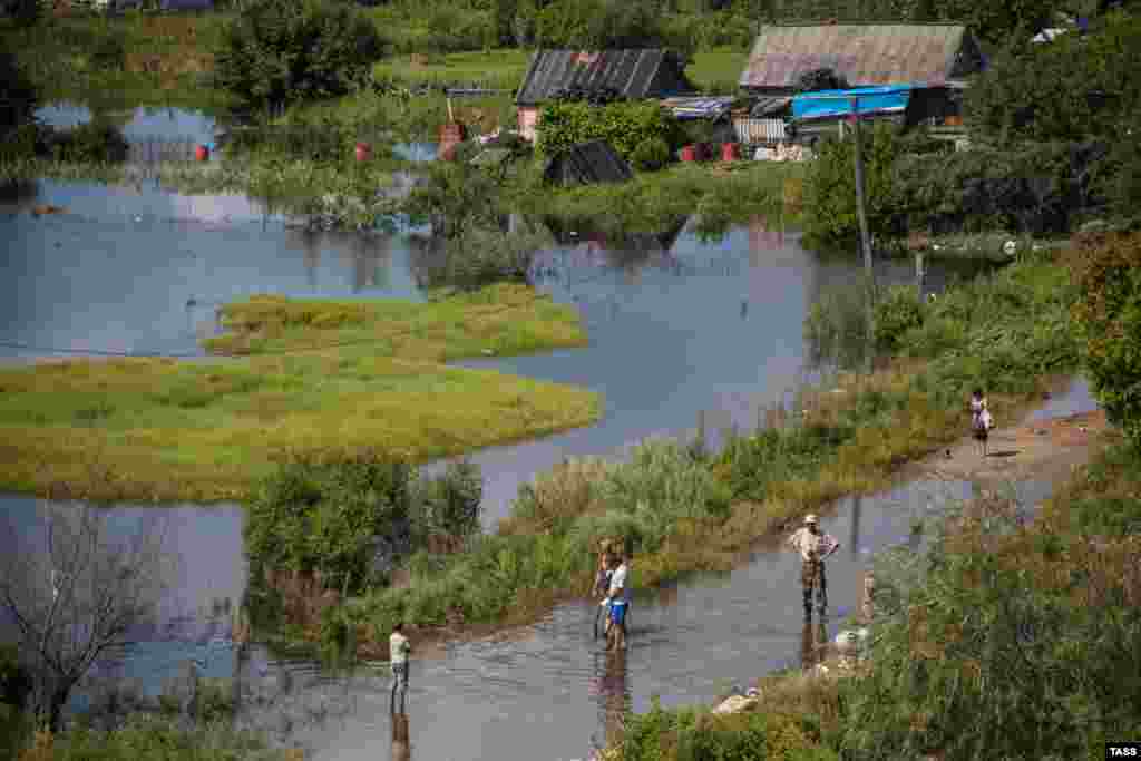 A flooded street in Krasnorechinskoye village near Khabarovsk