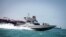 A boat of the Iranian Revolutionary Guard sails near to Stena Impero, a British-flagged vessel owned by Stena Bulk, in Iranian waters, August 22, 2019