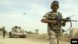Iraqi soldiers on patrol in Al-Kut.