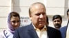 Pakistan's former prime minister, Nawaz Sharif, arrives at his office in central London on July 6.