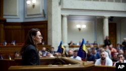 Ukraine's newly approved Prime Minister Yulia Svyrydenko speaks in the Ukrainian parliament in Kyiv on July 17. 