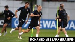 Domagoj Vida (center) takes part in a training session in Sochi on July 4.