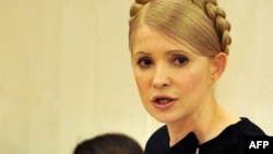 Prime Minister Yulia Tymoshenko speaks during a sitting of the Higher Administrative Court in Kyiv