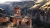 In a gorge that separates Armenia (background) from Turkey, the Monastery of the Hripsimian Virgins is one of the crumbling remnants of Ani, a capital once known as the &quot;City Of 1,001 Churches.&quot;