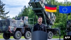 In June 2024, Ukrainian President Volodymyr Zelenskyy speaks during a news conference in northeastern Germany, where Ukrainian soldiers were being trained on Patriot missile systems.