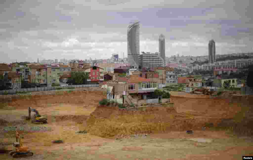 A lone house is seen at the construction site for urban transformation project in Fikirtepe, an Istanbul neighborhood, in the Asian part of the city. (Reuters/Murad Sezer)