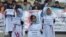 Protesters in central Bamyan Province condemned the attack on a girls' school in Kabul on May 8 that killed at least 50.