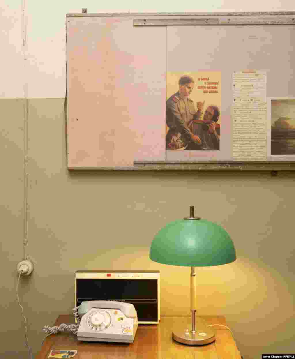 An office in the bunker with a poster reminding comrades not to chat on the telephone in case spies are listening. Kinder believes the ban on photography in some rooms is more about maintaining the mystique than hiding sensitive information.