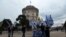 People begin gathering in Thessaloniki before a protest against the use of the name Macedonia by Greece's northern neighbor.