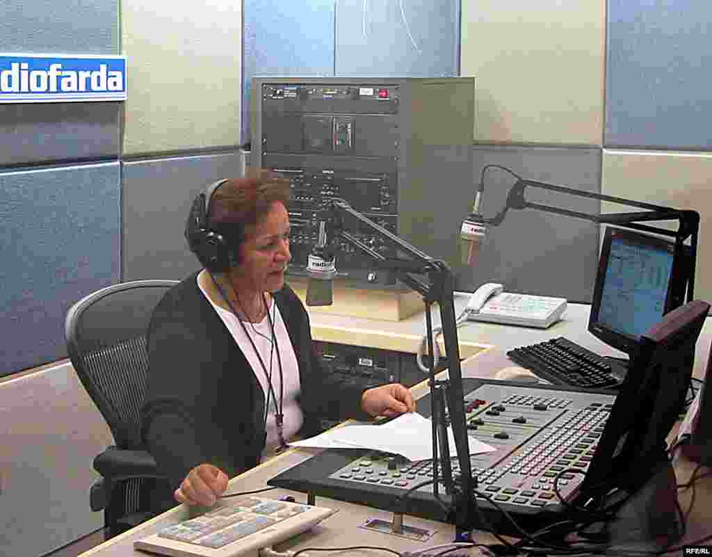 Broadcaster Maryam Ahmadi reads the first news broadcast of the new Radio Farda, RFE's service to Iran, December 2002.