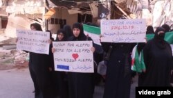 Syria -- Members of the "Free Women of Aleppo" protest against Russian air strikes. Aleppo. October 15, 2016.