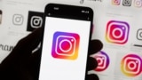 Logo Instagrama na mobilnom telefonu, 14. oktobar 2022.