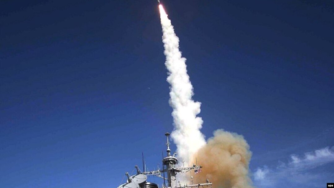 A missile is launched from the Aegis-combat-system-equipped destroyer "USS Decatur" during a Missile Defense Agency ballistic-missile flight test in 2007.