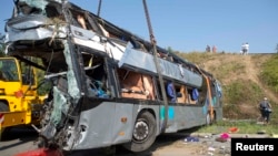 A wrecked bus at the site of the fatal accident near Dresden, Germany, on July 19. 