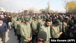 Members of Iran's Islamic Revolutionary Guard Corps take part in a demonstration against the assassination of the Iranian General Qasem Soleimani, head of the elite Quds Force, and Iraqi militia commander Abu Mahdi al-Muhandis won January 3.