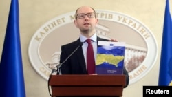 Ukrainian Prime Minister Arseniy Yatsenyuk at a news conference at the cabinet of ministers building in Kyiv on March 7.