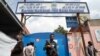 An Afghan policeman keeps watch outside of a hospital that came under attack in Kabul on May 13.