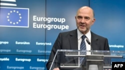 Представитель ЕС по экономике Пьер Московиси. Брюссель, 22 июня 2015 года. 