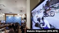 Один из брифингов с демонстрацией видеосвидетельств о применении химического оружия, Москва, 2 ноября 2017 года.