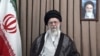 Ayatollahul Ali Khamenei într-o fotografie publicată pe site-ul său oficial, pe 18 iunie, înfățișându-l în timpul unei declarații pre-înregistrate în care respinge cererea de capitulare din partea președintelui american, Donald Trump. 