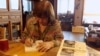 Belarus - Sviatlana Alexievich signs her new book '100 quotes on Radio Liberty",18jan2019