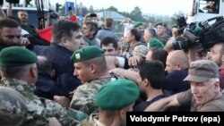 Simpatizanți ai fostului președinte georgian Mihail Saakașvili, forțează intrarea în Ucraina, 10 septembrie 2017