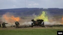 Tiruri de artilerie în cadrul exeercițiului militar Nordic shield -2015 la poligonul de la Bălți, 21 aprilie 2015.