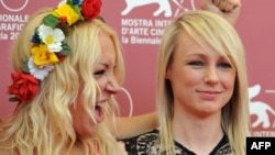 Director Kitty Green (right) and Femen activist Inna Shevchenko pose at the 70th Venice Film Festival.