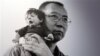 A cropped section of one of Liu Xia's photographs, of husband Liu Xiaobo and a doll