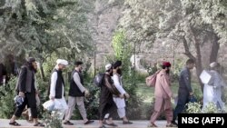 Taliban prisoners in the process of being released from Pul-e-Charkhi prison on the outskirts of Kabul in August