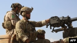 U.S. military spokesman in Baghdad Steve Warren said that while U.S. Special Operations Forces had historically and routinely worn the insignia of foreign troops they are working with, this case was not appropriate due largely to political sensitivities.
