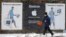 A man walks past an Apple billboard in Moscow. (file photo)
