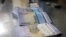 Large denomination Iranian banknotes show the devaluation of the rial. File photo