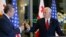 Georgian Prime Minister Giorgi Kvirikashvili (left) raises a toast with U.S. Vice President Mike Pence during an official dinner in Tbilisi on July 31.