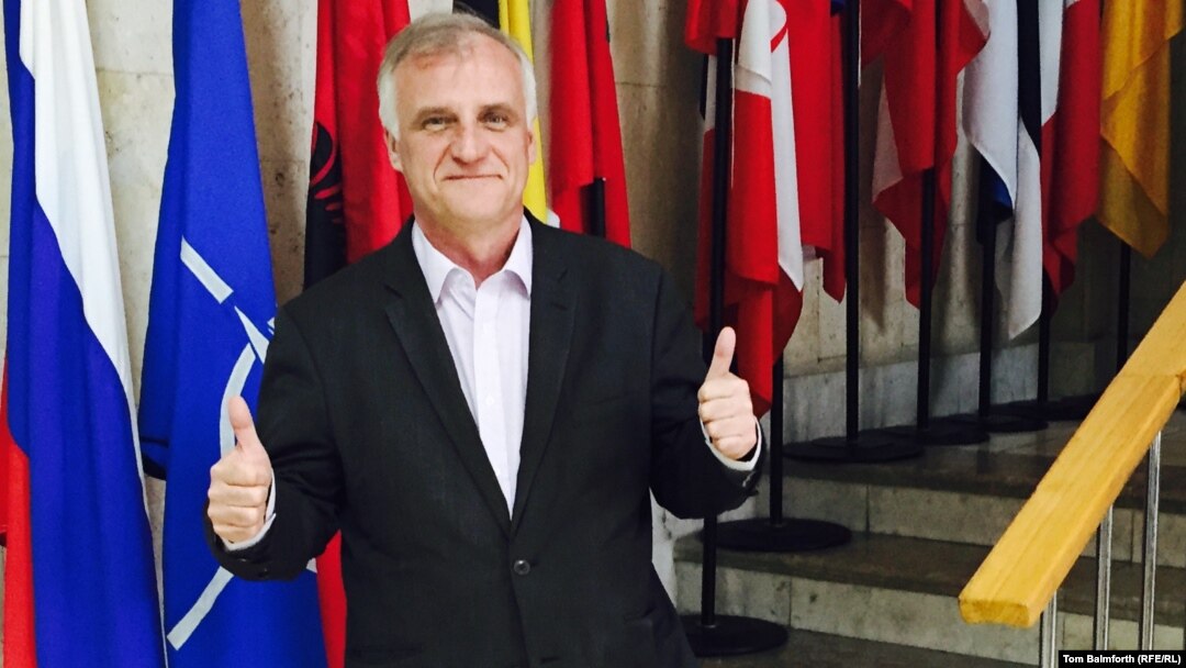 “It's cheap and easy to kick NATO," says Robert Pszczel, NATO's envoy to Russia.