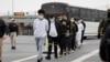 Migrants are deported back across the US border with Mexico in McAllen, Texas, on January 27. The Trump administration has been pressuring Serbia and other Balkan countries to accept migrants deported by the United States.